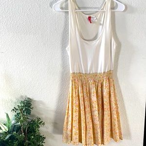 Pleated pastel floral dress.